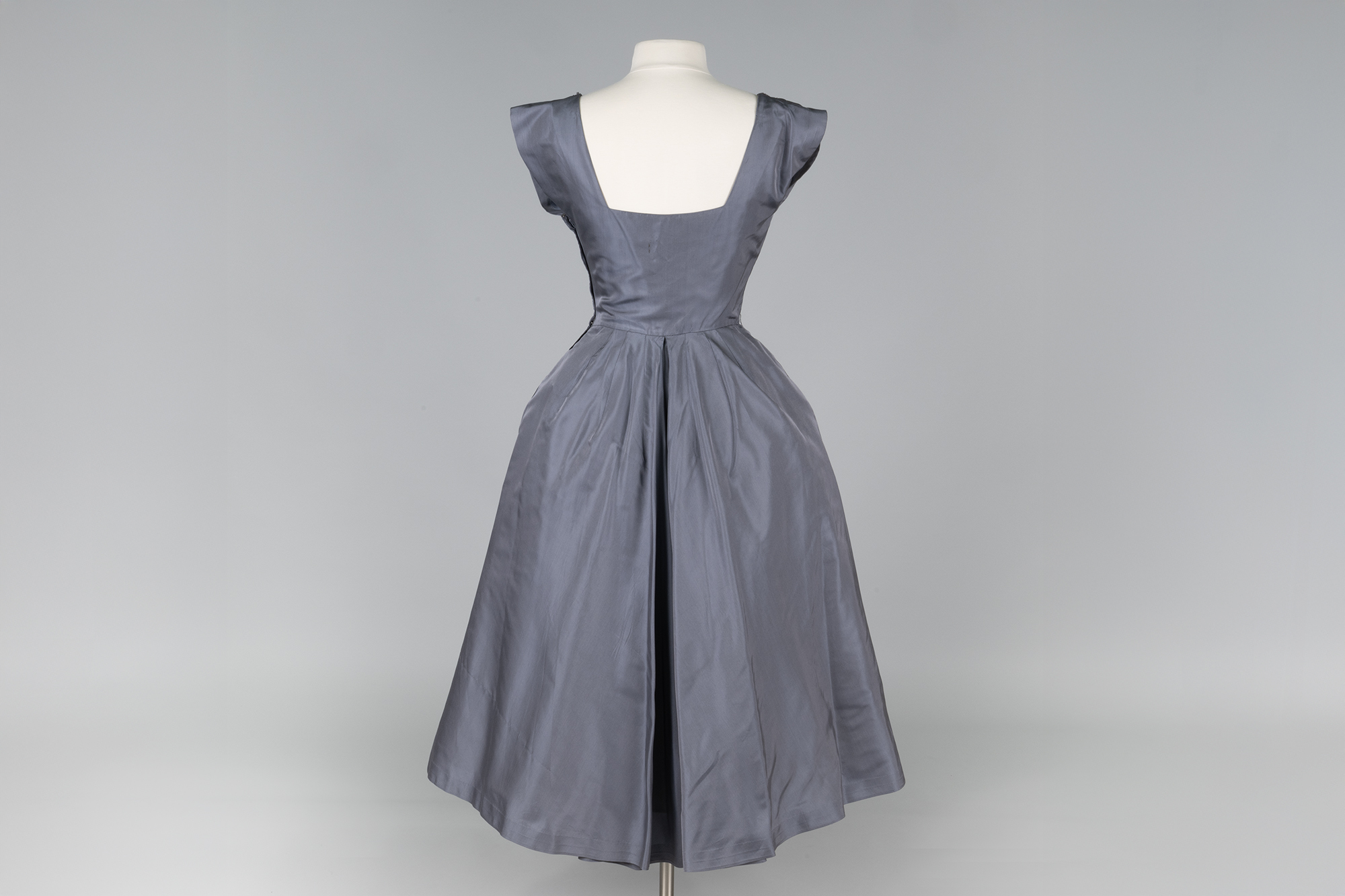 Image of Grey silk tea-length evening gown worn by Evelyn Baker Langlie, 1958